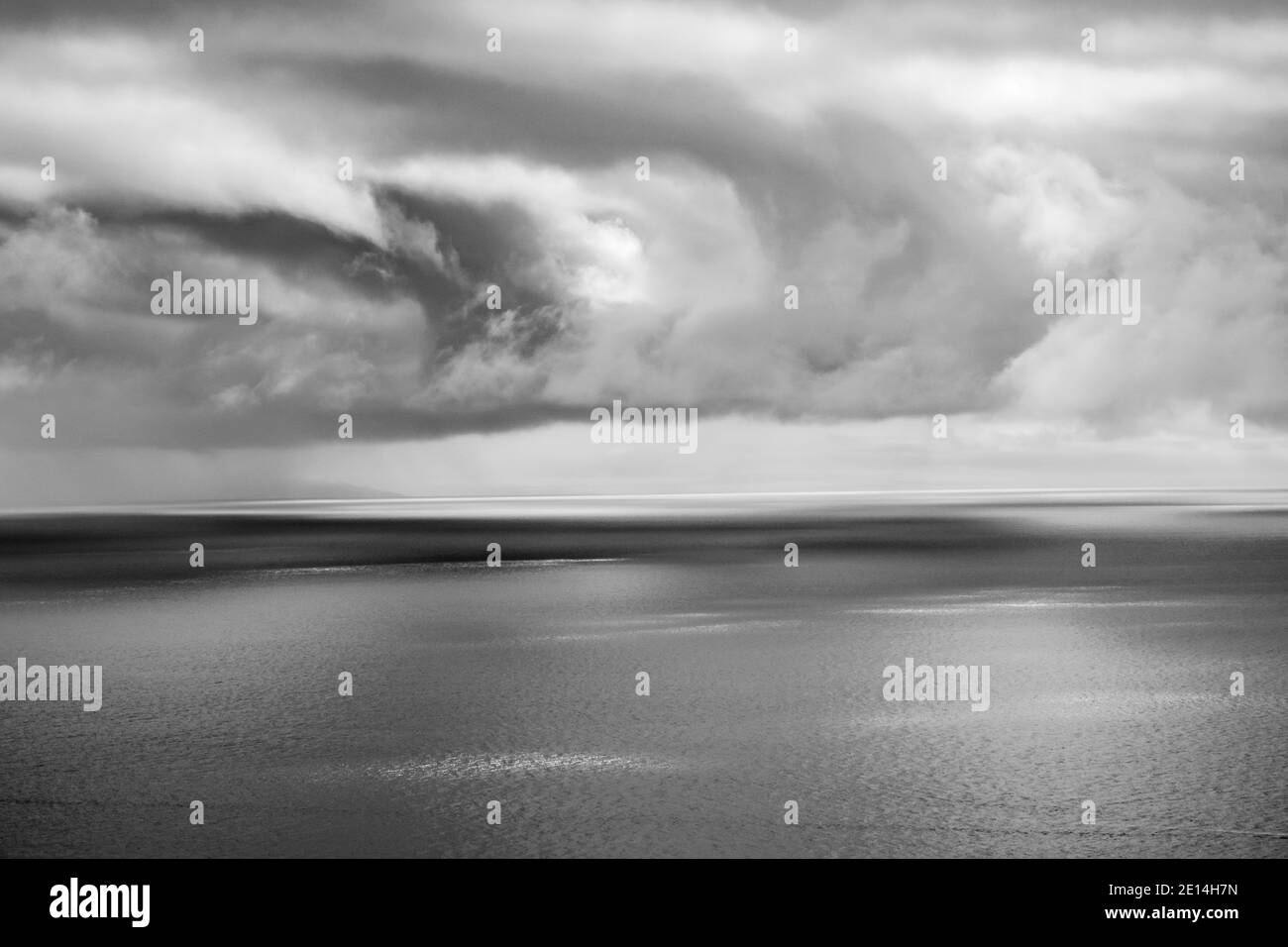 Clouds Over The Ocean In Black And White Stock Photo - Alamy