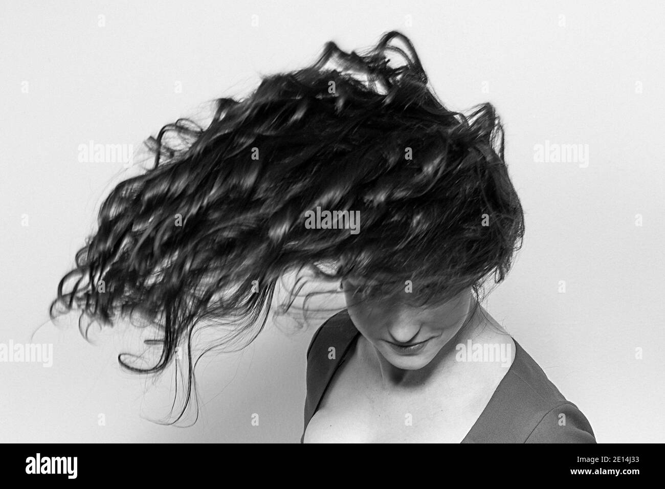 Crazy And Wild - Young Spirited Woman Lets Her Hair Fly Stock Photo