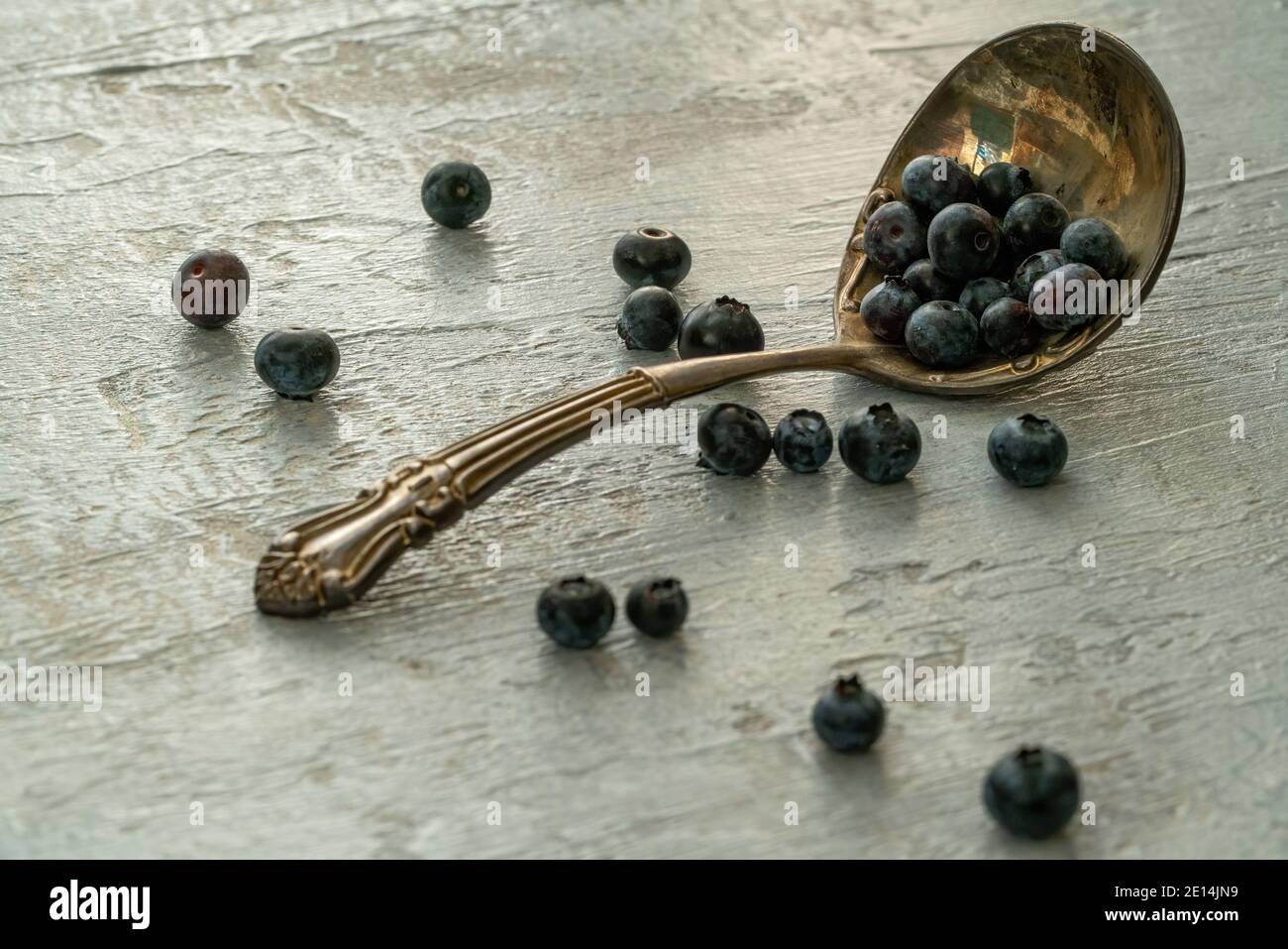Fresh blueberry in metal spoon isolated Stock Photo
