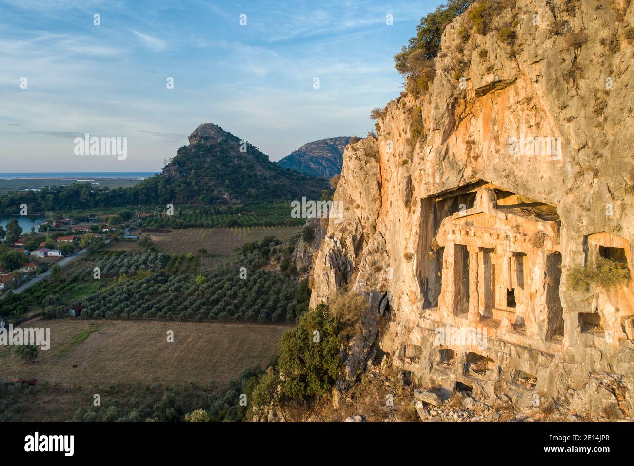 Aerial view of sunrise on an ancient Lycian rock tomb near the town of Dalyan, Muğla province, Turkey Stock Photo
