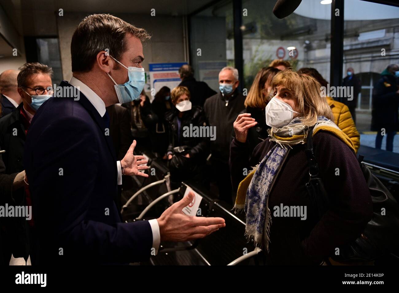 French Health Minister Olivier Veran Talks To A Woman As He Arrives To Attend The Vaccination