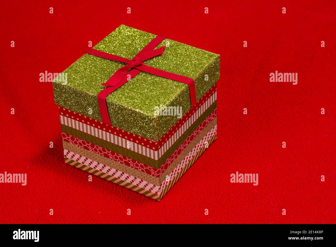 Christmas Gift Box On Red Background Stock Photo