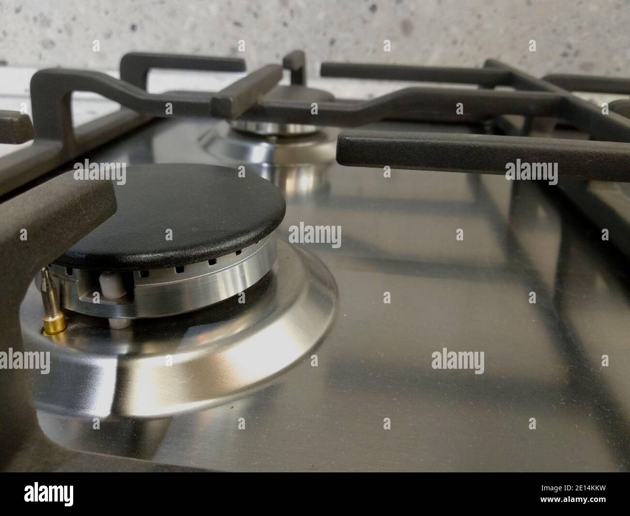 Modern kitchen stove on kitchen wall background Stock Photo - Alamy