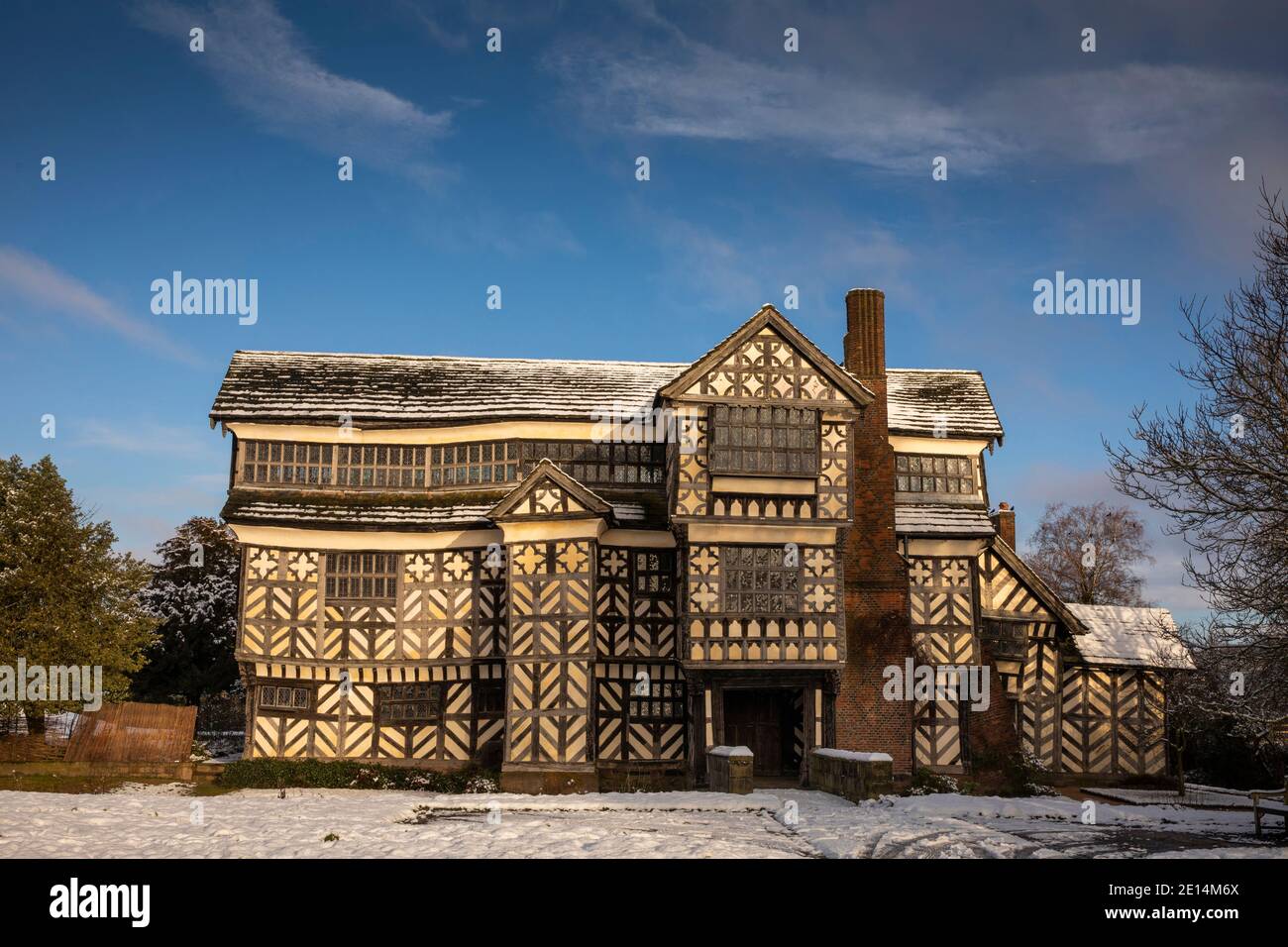 UK, England, Cheshire, Scholar Green, Little Moreton Hall, timber-framed Tudor Farmhouse entrance, in winter Stock Photo