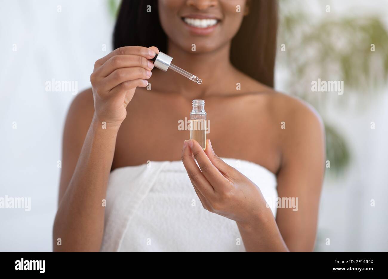 Moisturizing with serum, collagen and hyaluronic acid Stock Photo
