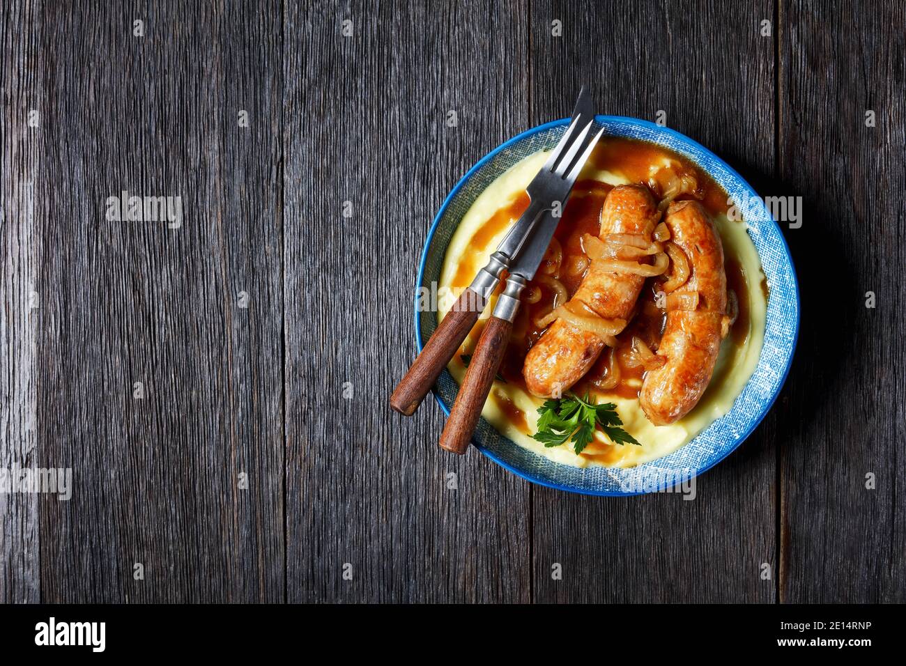 Bangers and mash traditional british dish of pork sausage with onion