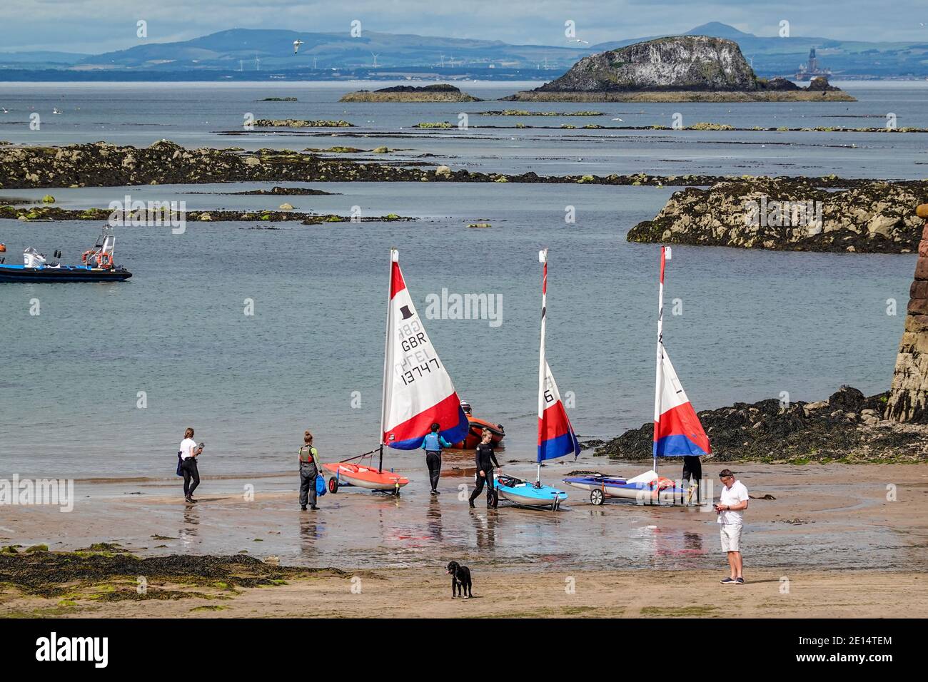 Three Topper dinghies being used for dinghy sailing training Stock