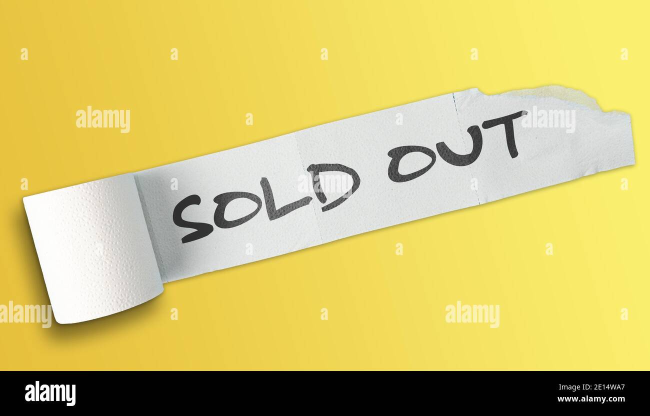 SOLD OUT written on partially unrolled roll of toilet paper on yellow background Stock Photo