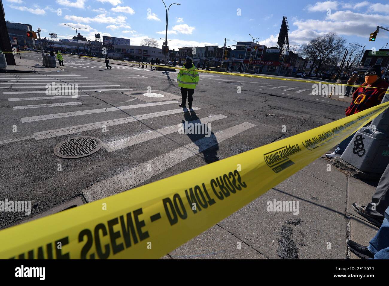 New York, USA. 04th Jan, 2021. Police tape seals off access to Queens Boulevard as the NYPD investigate a bomb scare around a suspicious vehicle parked on the up-ramp of the Queens Place Mall shopping center's garage, in the Elmhurst section of the Queens borough of New York, NY, January 4, 2021. The Bomb scare, which was determined to be a hoax by the NYPD, prompted an evacuation of the area as police sealed off the block around the mall and shut down parts of Queens Boulevard. (Photo by Anthony Behar/Sipa USA) Credit: Sipa USA/Alamy Live News Stock Photo