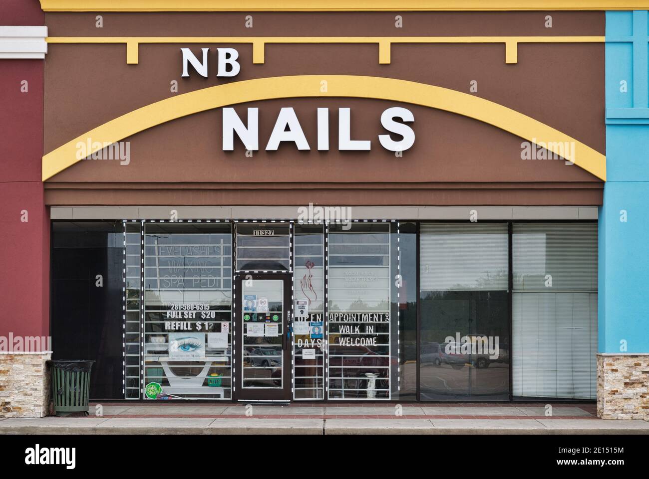 Houston, Texas USA 11-26-2020: NB Nails salon storefront in Houston, TX. Cosmetology health and beauty profession. Stock Photo