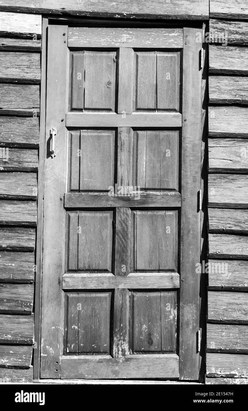 White painted wooden door on a light background washed wood Stock Photo