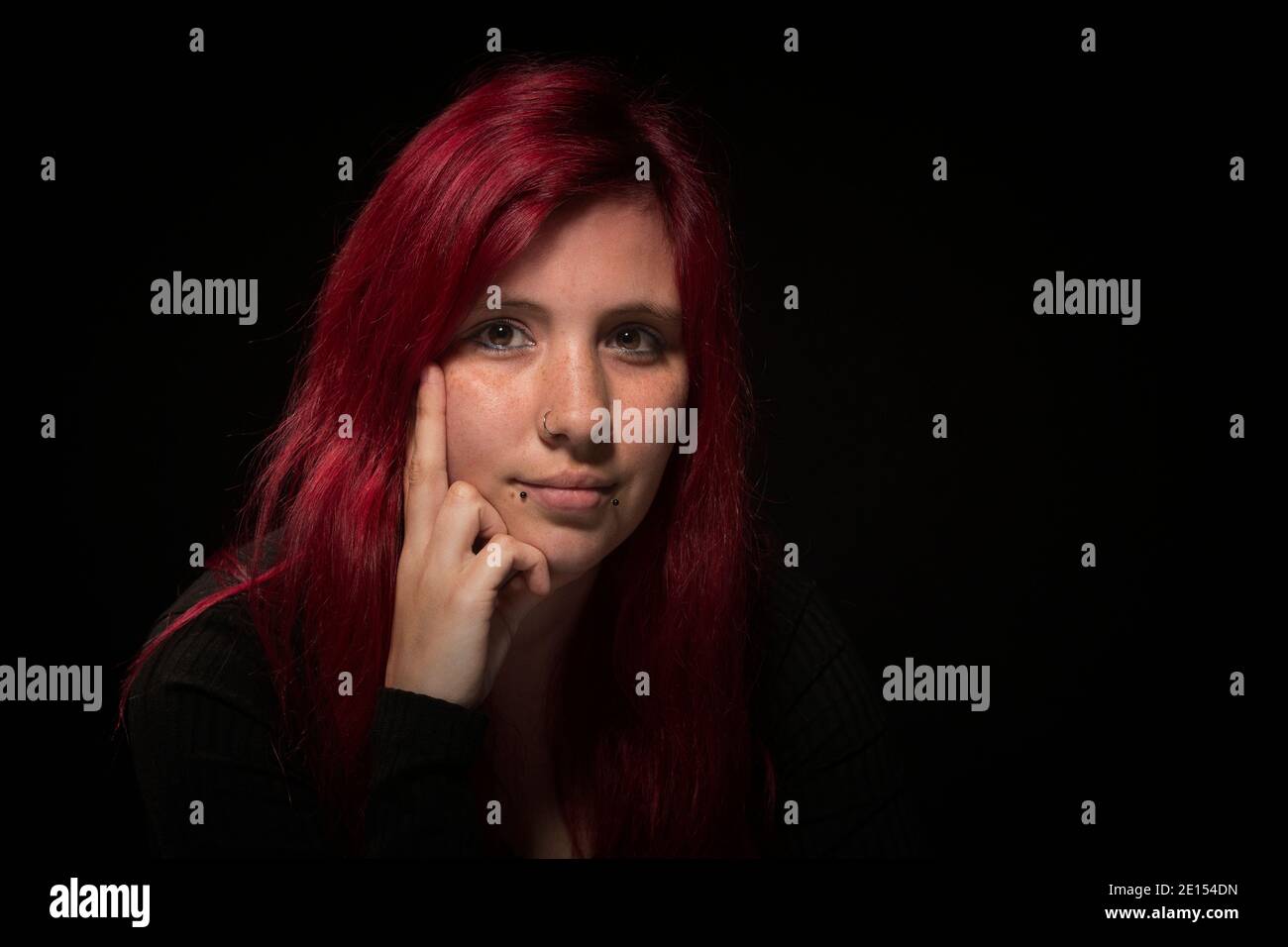 Portrait Of A Young Woman With Red Hair Stock Photo - Alamy