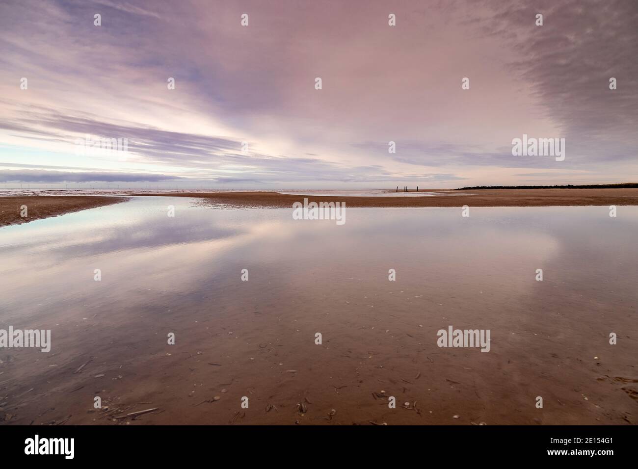 Tidal pool on Prestatyn Beach, North Wales Stock Photo