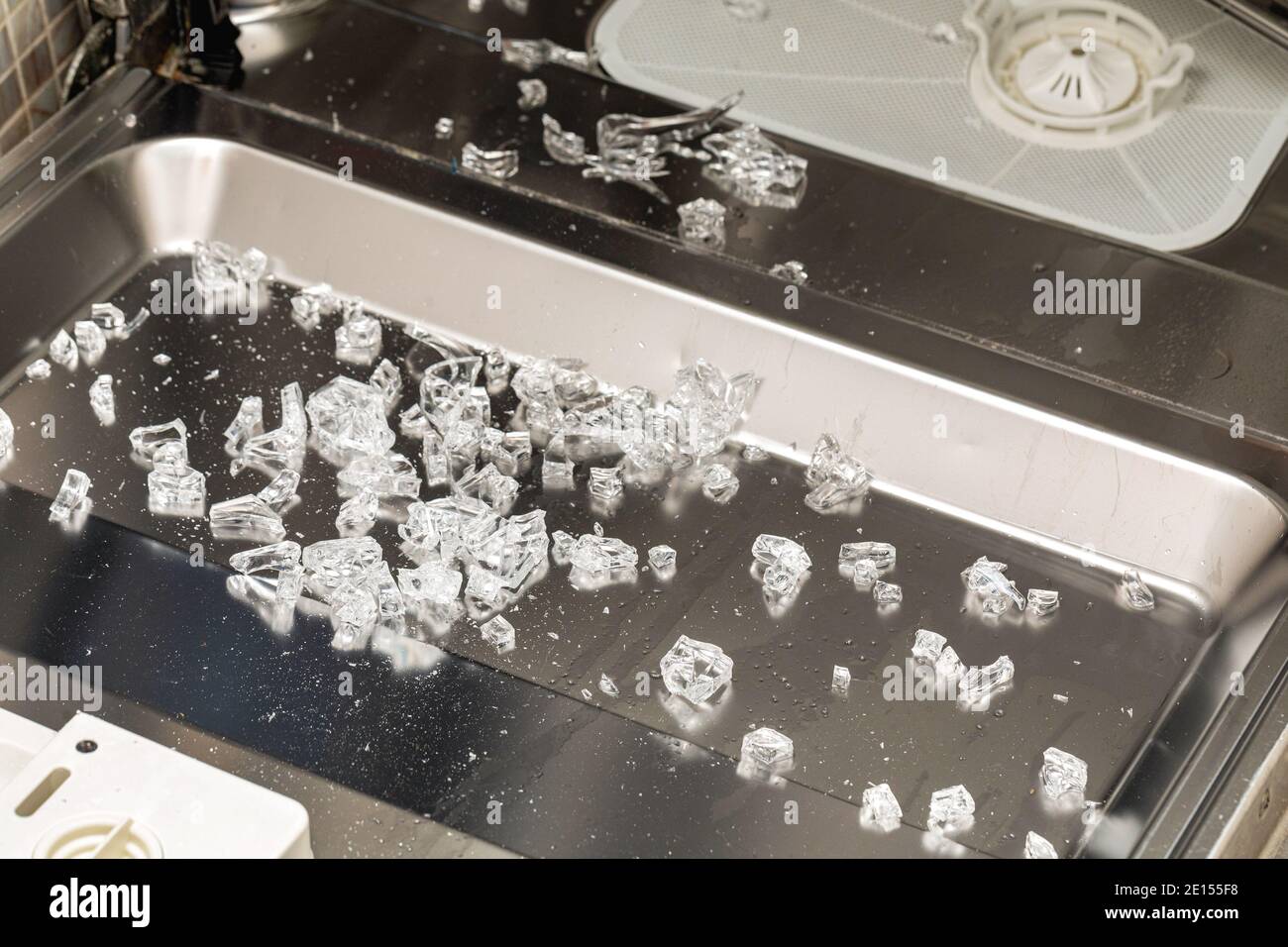 Broken Glass Pieces Shards in Dishwasher Machine Damage Stock Photo Alamy
