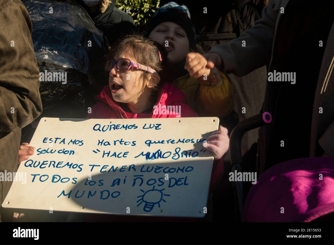 Hundreds of residents of the Cañada Real Galiana have gathered this Monday in front of the headquarters in the capital of Naturgy, a company that prov Stock Photo