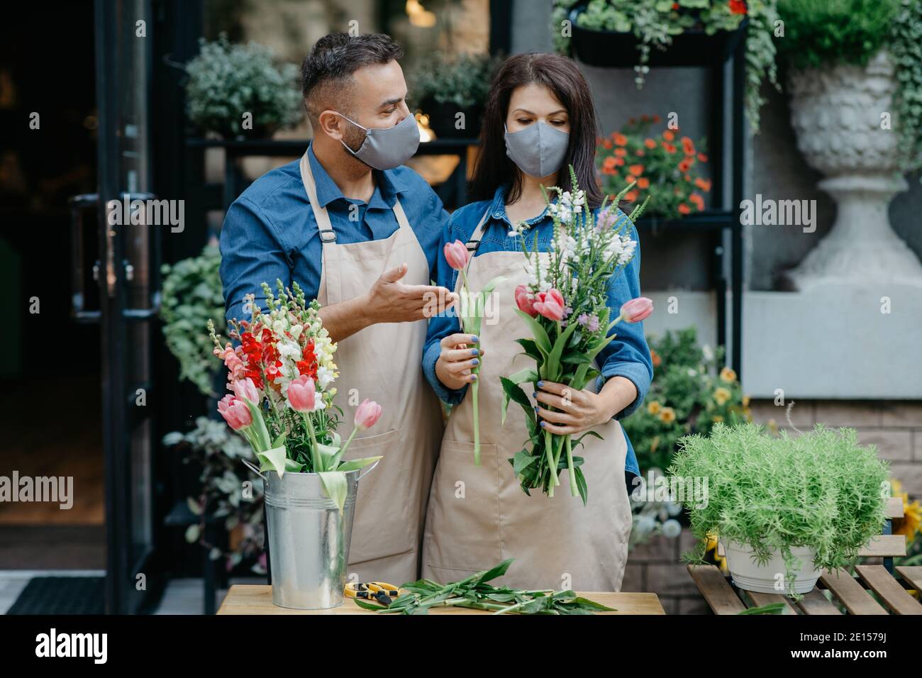 Creative occupation in floral boutique and social distance Stock Photo