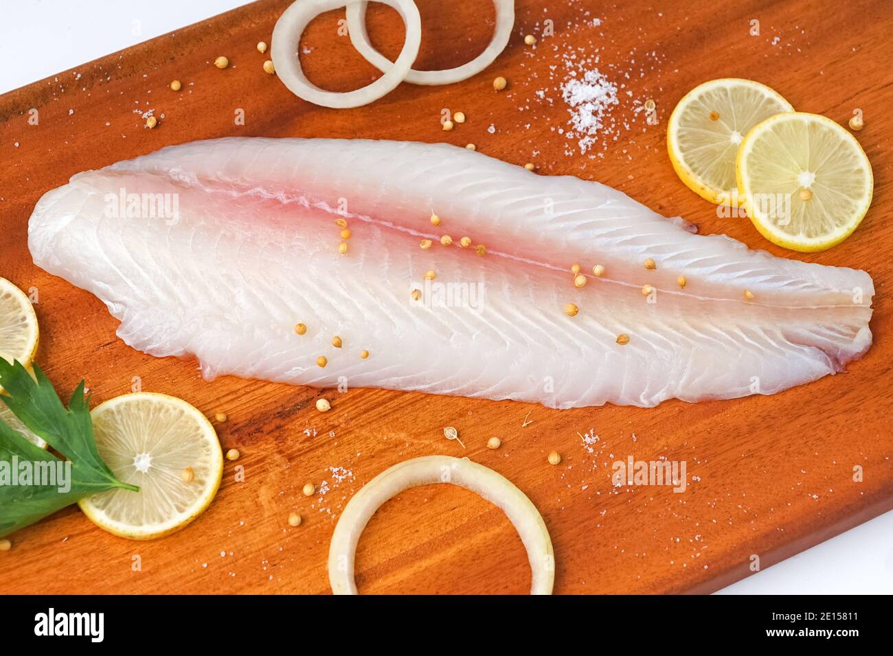fresh fillet dory fish on wooden tray Stock Photo Alamy