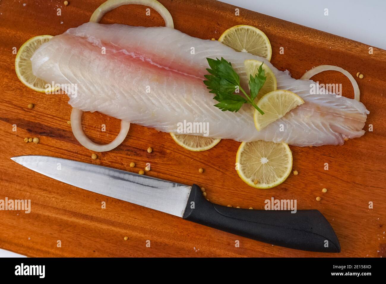 fresh fillet dory fish on wooden tray Stock Photo Alamy