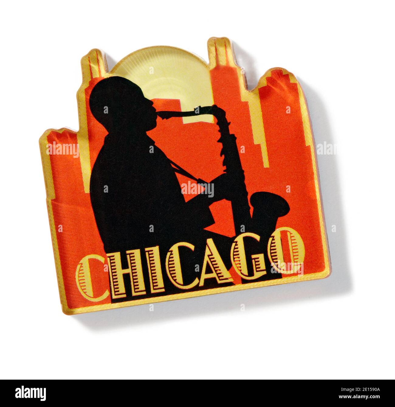 Red and Yellow Chicago Jazz theme magnet photographed on a white background Stock Photo