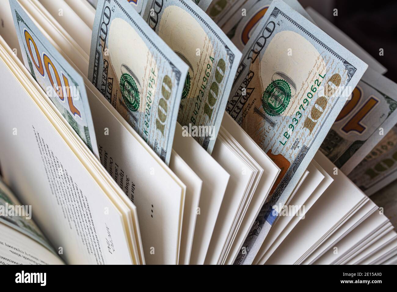 dollar banknotes in open book Stock Photo