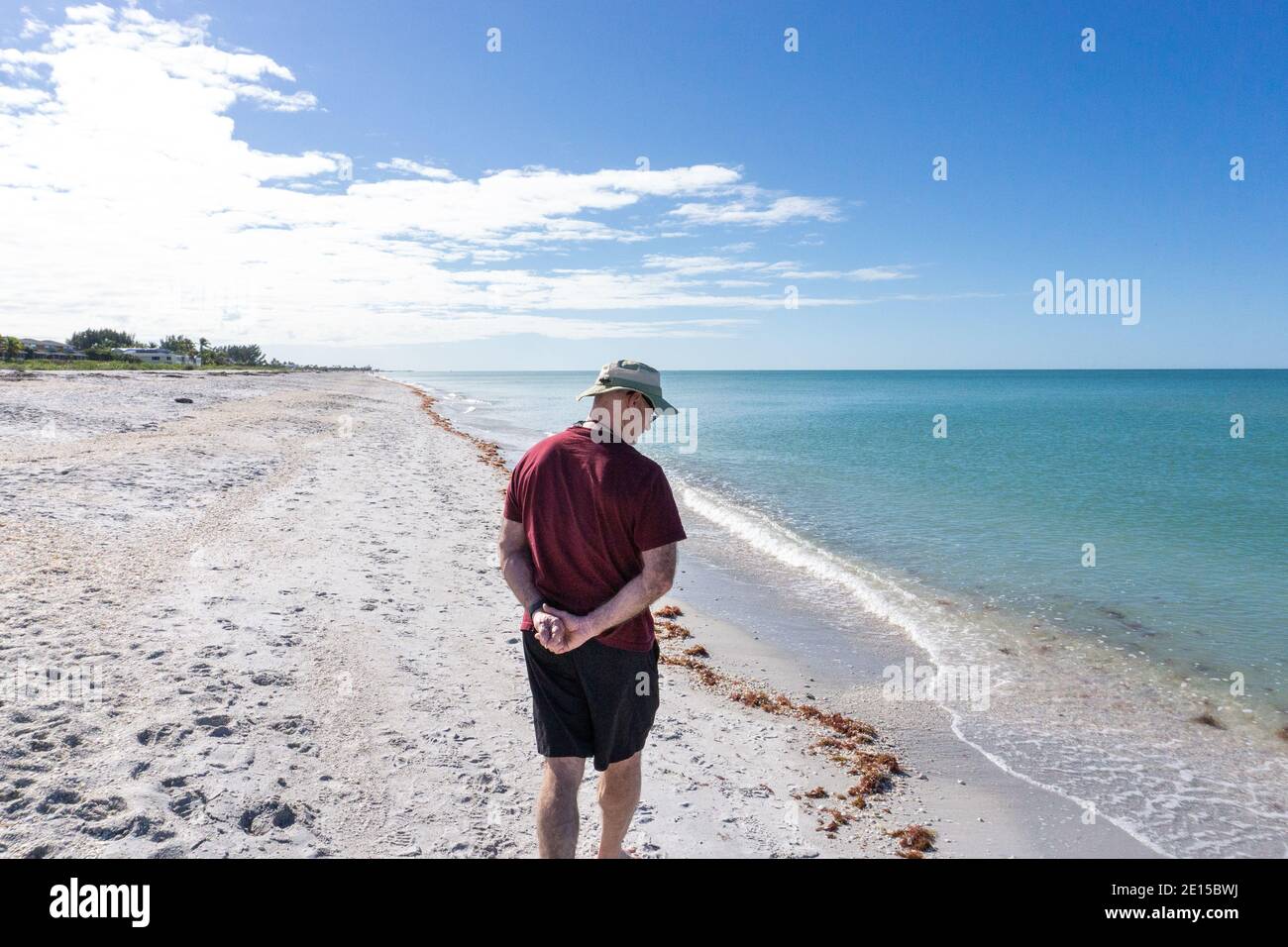 Man with hands behind back hi-res stock photography and images - Alamy