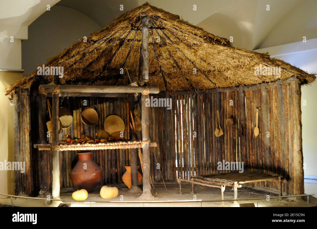 Amazon area. Jivaroan peoples (the Shuar). Isolated circular house. Representation of the cosmos. It allows the inhabitant to orient himself within the universe. The beam that supports the house symbolizes the union of earth and sky. Museum of the Americas. Madrid, Spain. Stock Photo