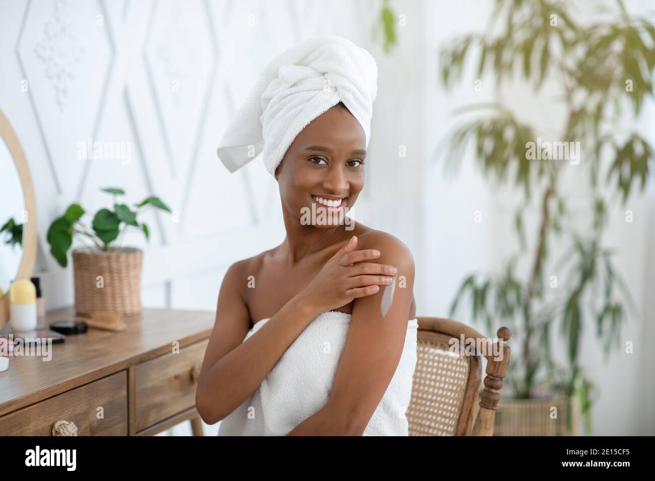 Routine care of skin and moisturizing after shower at home during covid-19 pandemic Stock Photo