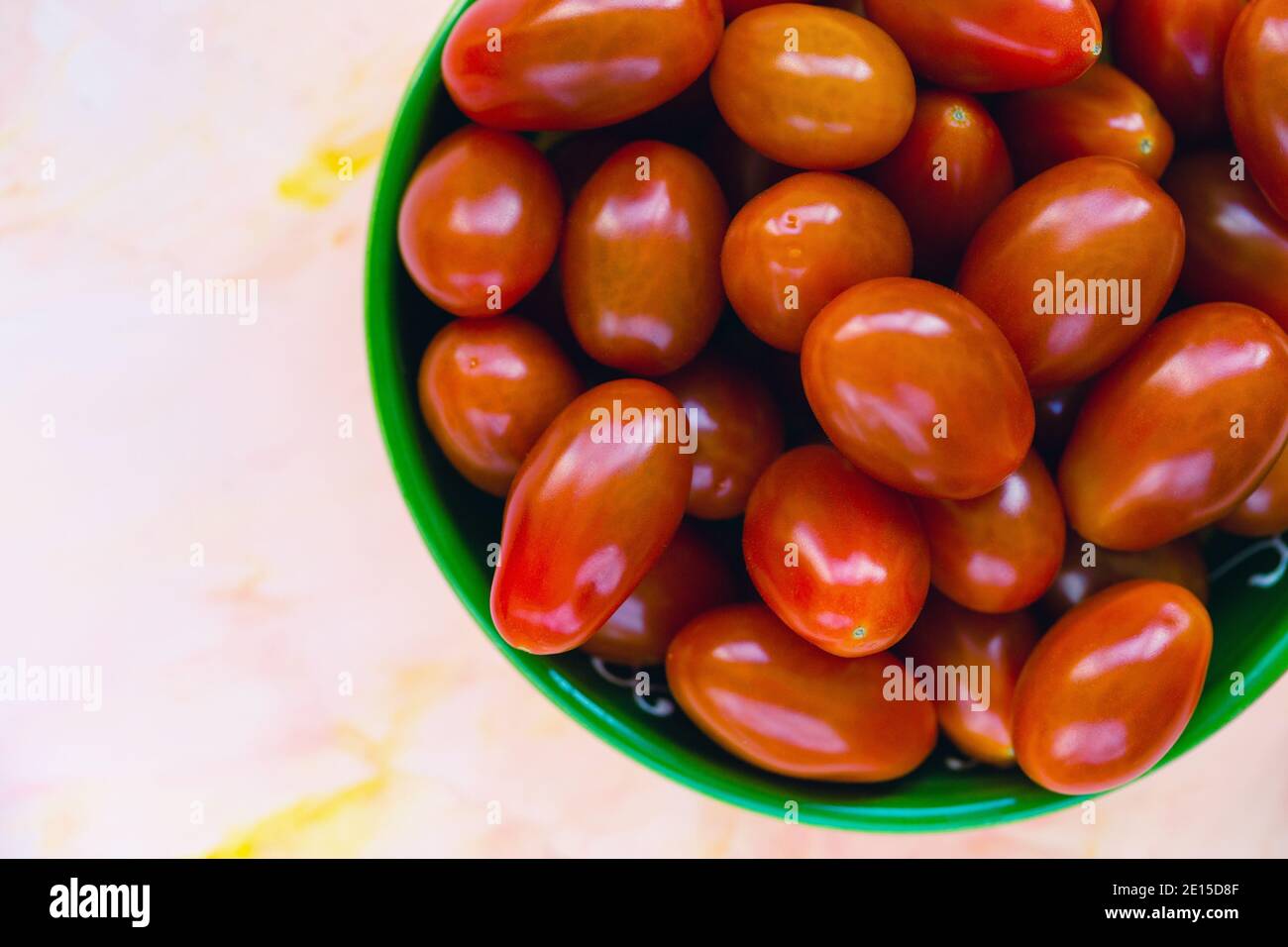 Fresh red cherry tomatoes on light background Stock Photo