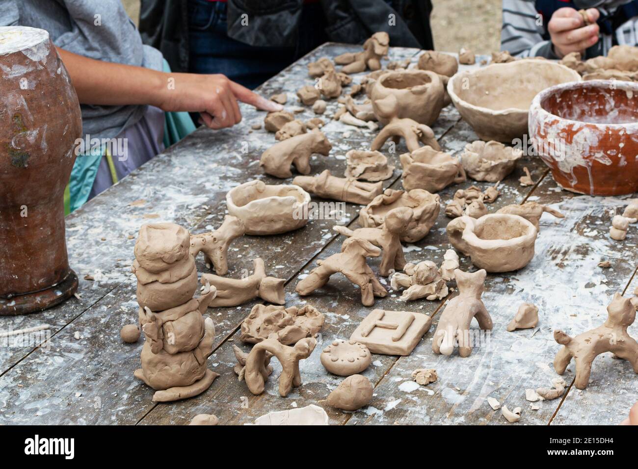 Moscow, Russia September 5, 2020. Children sculpt clay figurines in