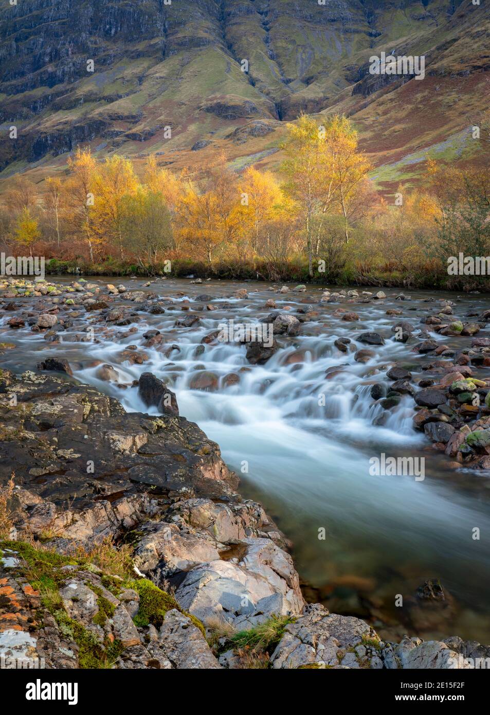 Glencoe, Scotland: River Coe flowing through highland hills in autumn Stock Photo