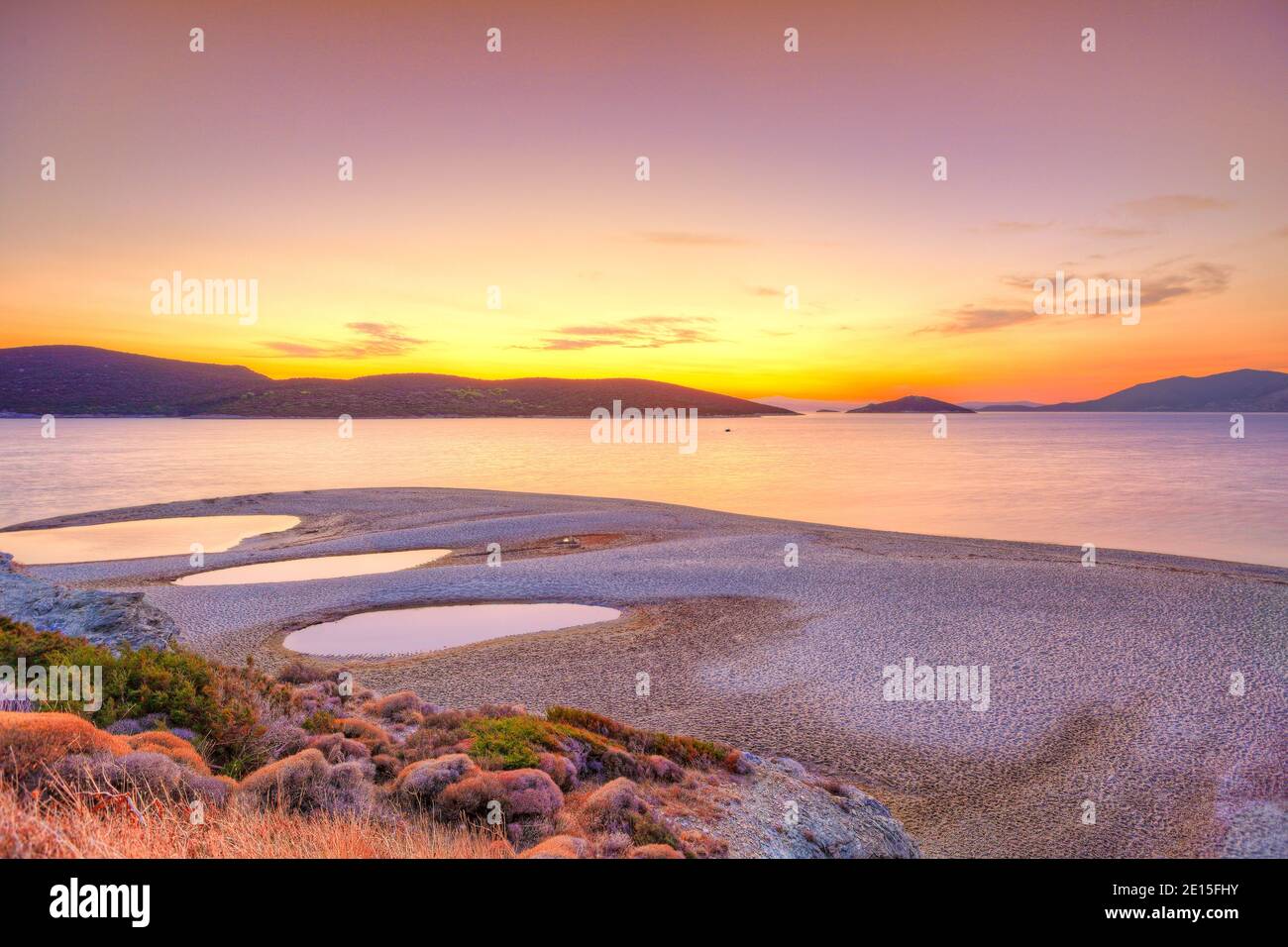 The sunset at the beach Megali Ammos of Marmari in Evia, Greece Stock Photo