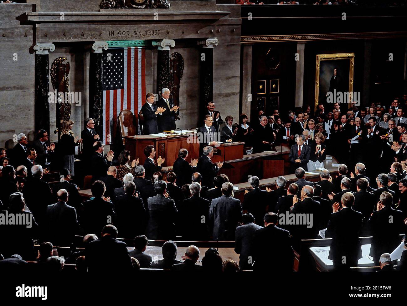 Washington, DC. USA, March 6, 1991 President George H.W. Bush delivers his Address Before a Joint Session of the Congress on the Cessation of the Persian Gulf Conflict, to a standing ovation lead by Vice President Daniel Quayle and Speaker of the House Tom Foley Stock Photo