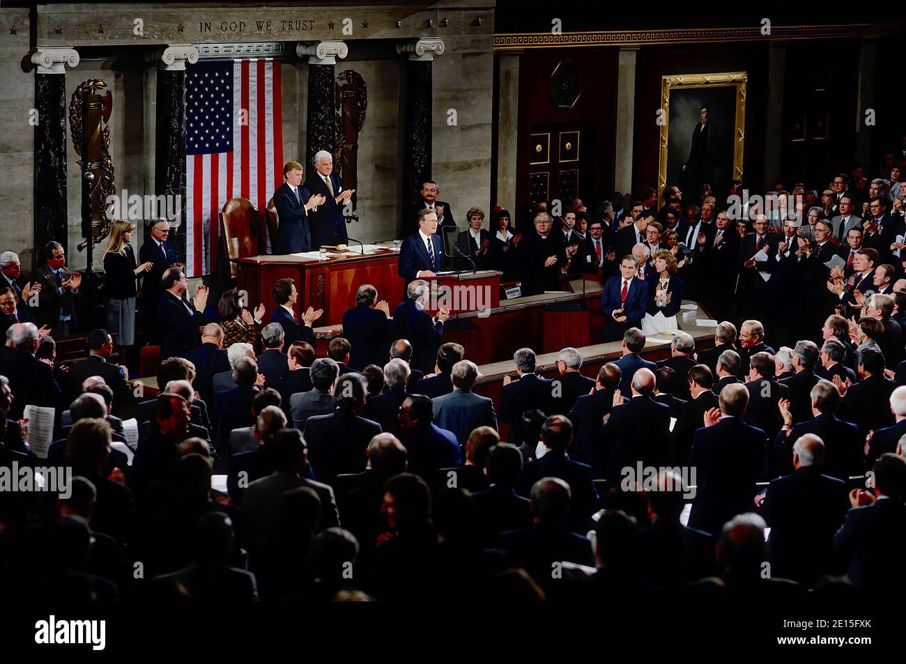 Washington, DC. USA, March 6, 1991 President George H.W. Bush delivers his Address Before a Joint Session of the Congress on the Cessation of the Persian Gulf Conflict, to a standing ovation lead by Vice President Daniel Quayle and Speaker of the House Tom Foley Stock Photo