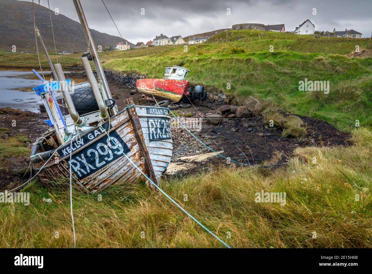 South Harris, Isle of Lewis and Harris, Scotland: Old fishing boats stranded at low tide Stock Photo