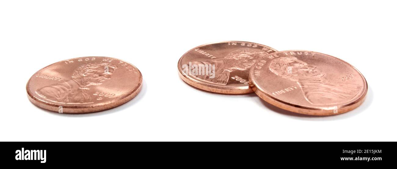 Three heads up pennies photographed on a white background Stock Photo