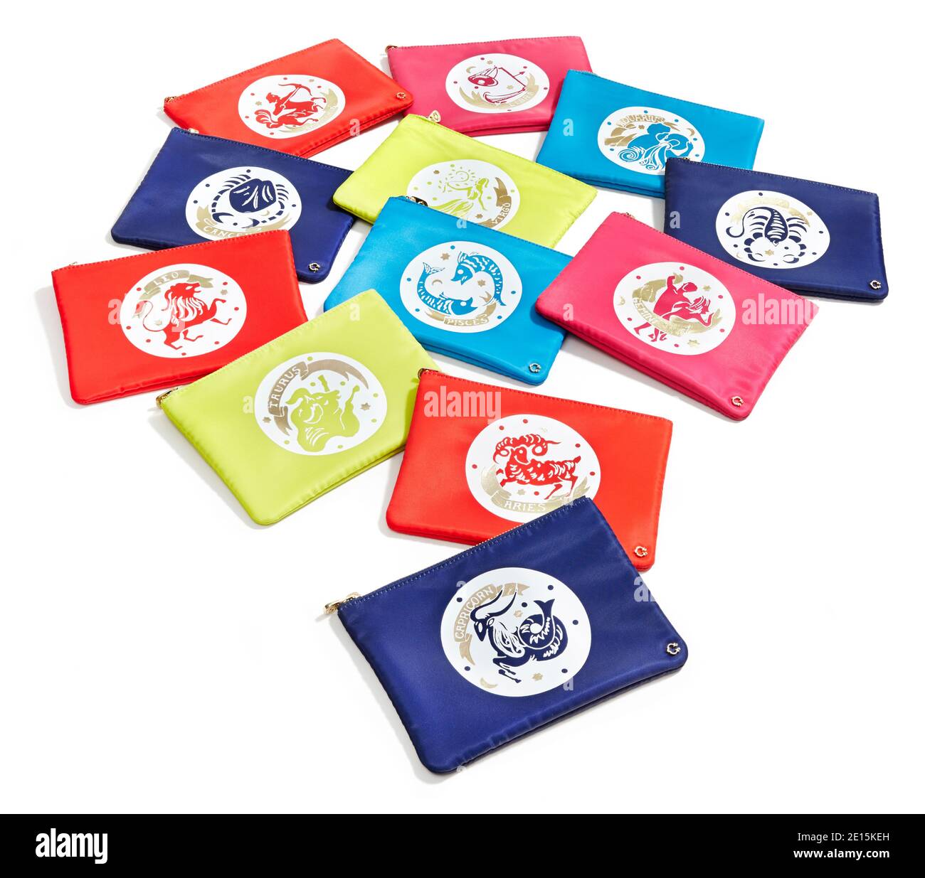 Zodiac sign coin purse collection from the HOLIDAY 2014 C.Wonder Look Book photographed on a white background. Stock Photo