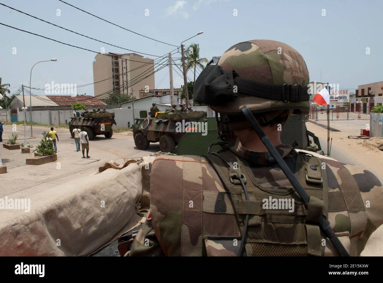 French troops patrolling with armored vehicles (VAB) in a street of Abidjan, Ivory Coast on April 2, 2011. France has also boosted its UN Licorne (Unicorn) mission in the cocoa-rich nation by 300 to around 1,400 troops, where part of their mission is to protect foreigners from attacks and looting amid rising insecurity. Photo by SCH Blanchet/ECPAD/ABACAPRESS.COM Stock Photo
