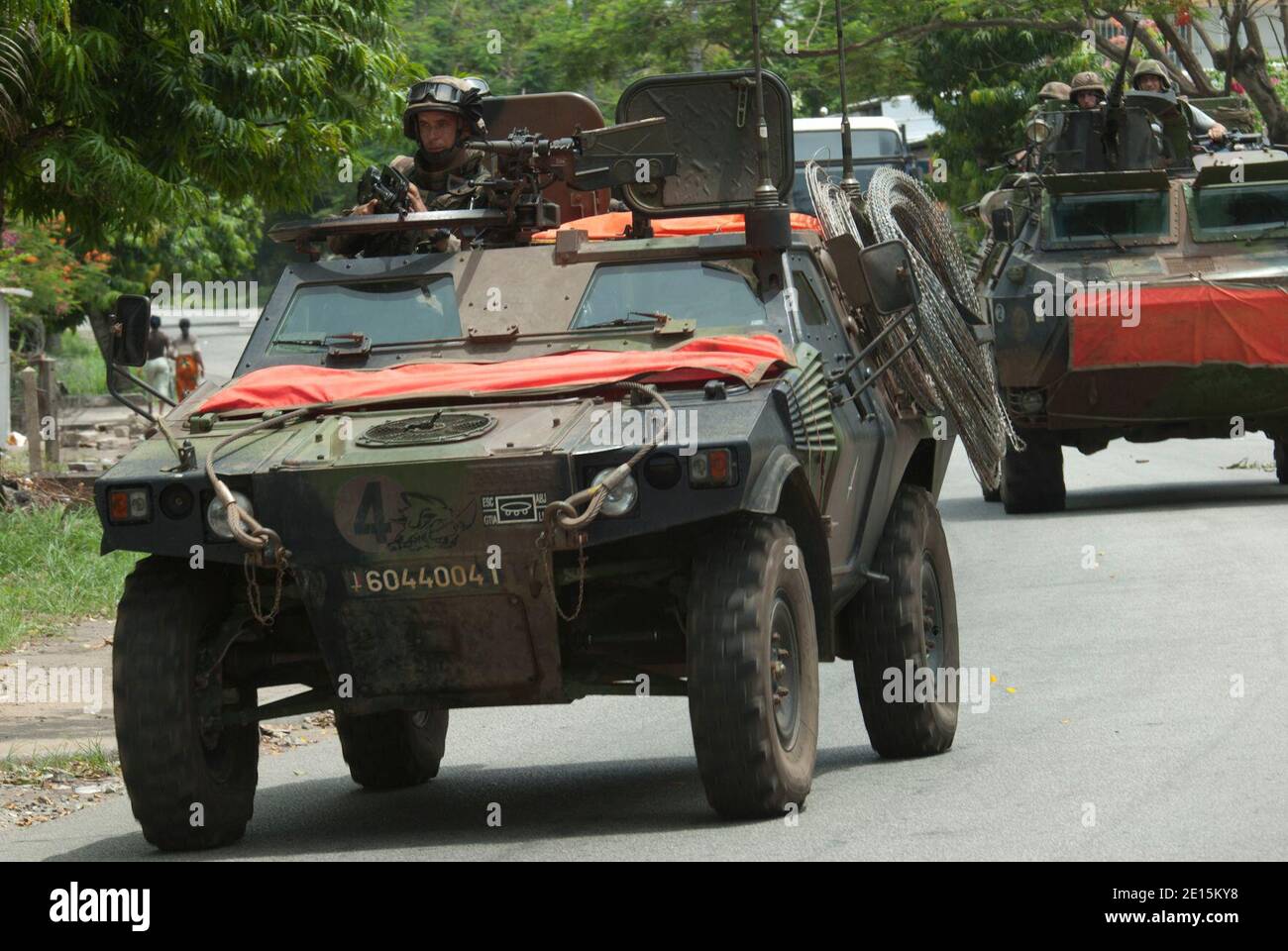 French troops patrolling with armored vehicles (VAB) in a street of Abidjan, Ivory Coast on April 2, 2011. France has also boosted its UN Licorne (Unicorn) mission in the cocoa-rich nation by 300 to around 1,400 troops, where part of their mission is to protect foreigners from attacks and looting amid rising insecurity. Photo by SCH Blanchet/ECPAD/ABACAPRESS.COM Stock Photo