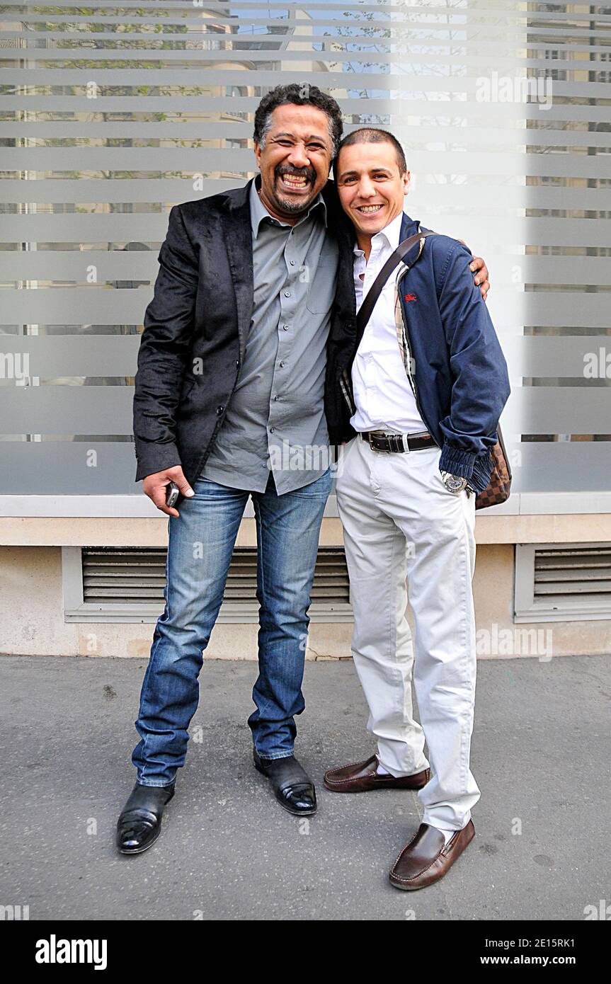 EXCLUSIVE - Singers Faudel and Khaled pose in Paris, France on April 8, 2011. Photo by Thierry Plessis/ABACAPRESS.COM Stock Photo
