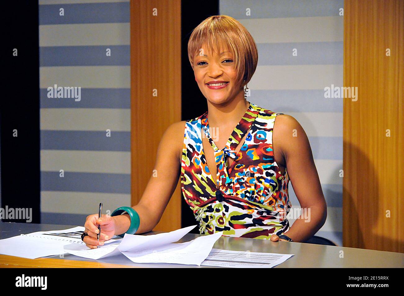 Presenter of Telesud Nadine Patricia Mengue poses for our photographer 