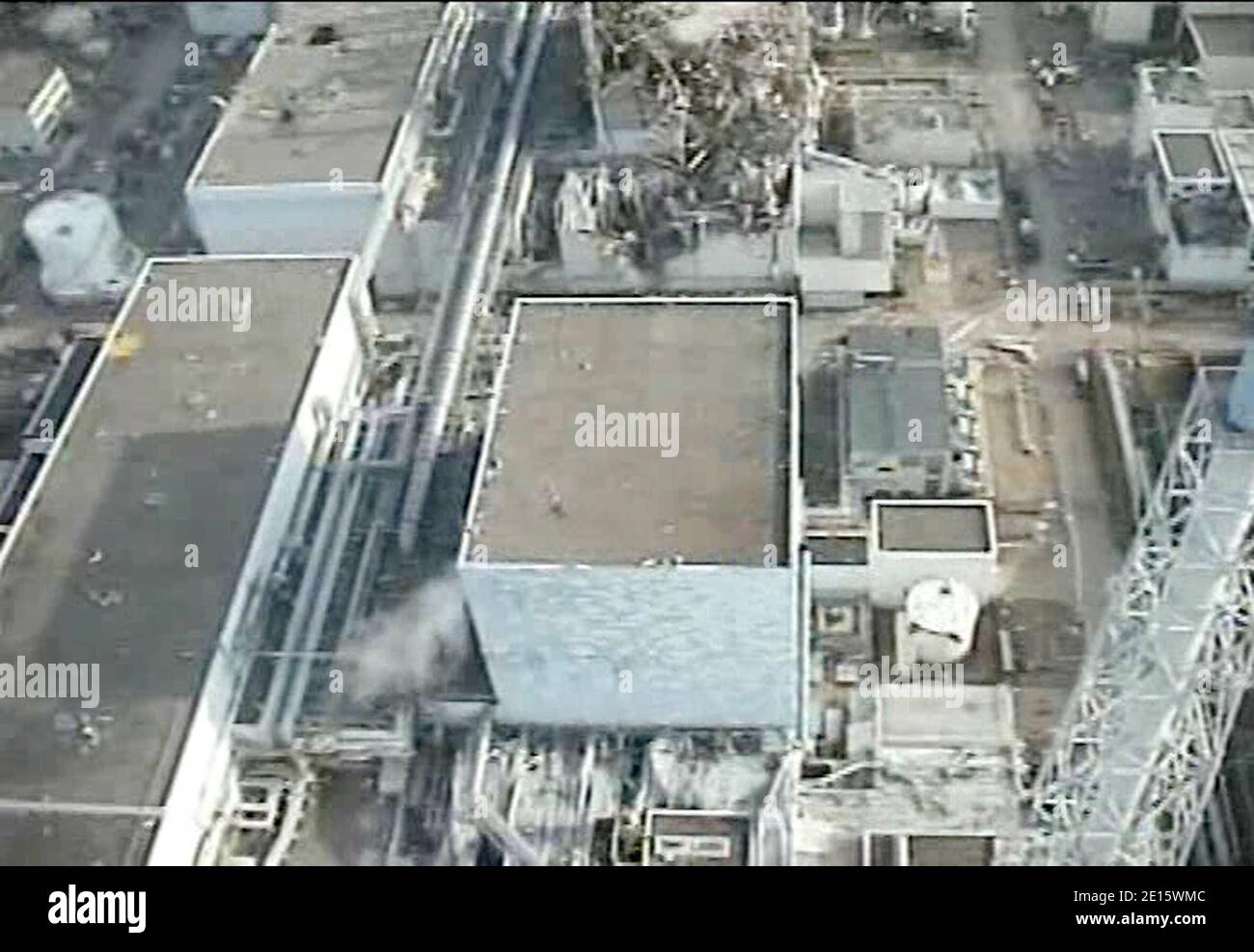 This Sunday, April 10, 2011 image taken by T-Hawk drone aircraft shows the reactor building of Unit 2, center, of the tsunami-crippled Fukushima Dai-ichi nuclear power plant in Okuma town, Fukushima Prefecture, northeastern Japan. The American drone aircraft T-Hawk made by Honeywell was used by TEPCO to inspect hard-to-access areas of the plant. The drone can be operated from six miles (10 kilometers) away and transmit video and still images. Hand out photo via ABACAPRESS.COM Stock Photo