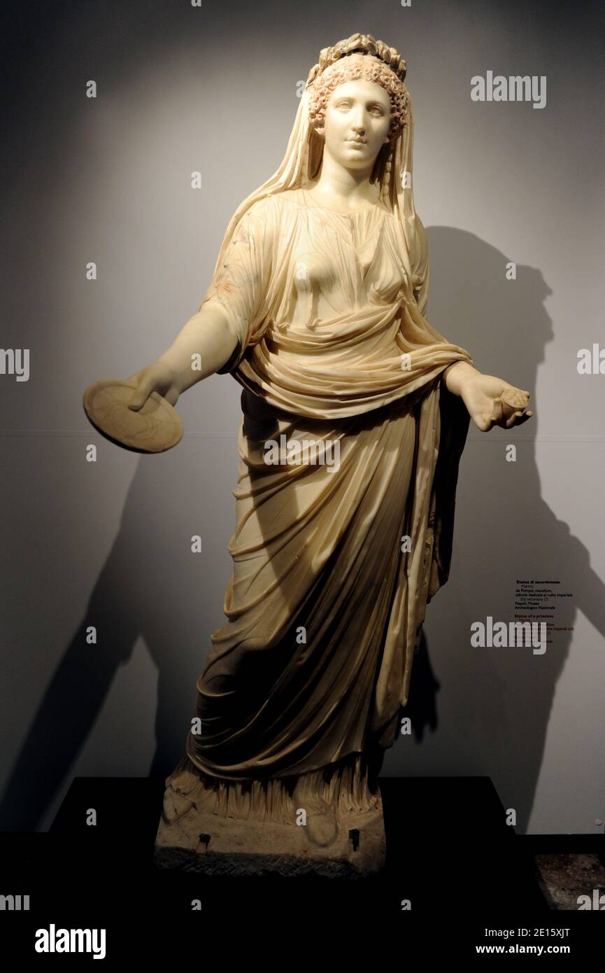 A marble statue of a priestess is pictured in the Neronian Cryptoporticus in Rome, Italy on april 12,2011.The exhibit 'Nerone', examining the life and dark legends of Emperor Nero (37-68 AD), opens in Rome across five different landmarks of the ancient imperial capital. Nero has been infamous throughout history for tyranny, extravagance, cold-blooded murder, and cruel persecution of Christians. Ancient Roman historians accused him of killing his mother, stepbrother and two wives, and of burning Christians at night in his garden for firelight. He was known as the emperor 'who fiddled while Rome Stock Photo