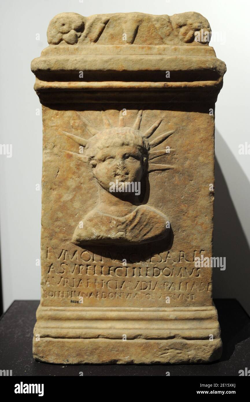 Altar dedicated to the sun, depicted with Nero's features pictured at the exhibit 'Nerone', examining the life and dark legends of Emperor Nero (37-68 AD), which opens in Rome ,Italy on April 12, 2011 across five different landmarks of the ancient imperial capital. Nero has been infamous throughout history for tyranny, extravagance, cold-blooded murder, and cruel persecution of Christians. Ancient Roman historians accused him of killing his mother, stepbrother and two wives, and of burning Christians at night in his garden for firelight. He was known as the emperor 'who fiddled while Rome burn Stock Photo