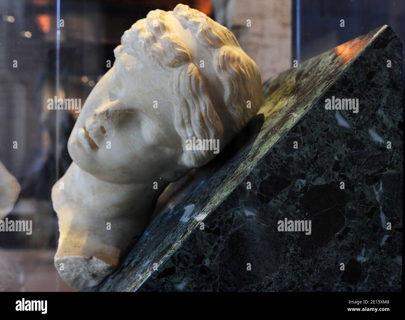 Head of a sleeping girl, from Subiaco, so-called Villa of Nerone, is pictured at the exhibit 'Nerone', examining the life and dark legends of Emperor Nero (37-68 AD), which opens in Rome ,Italy on April 12, 2011 across five different landmarks of the ancient imperial capital. Nero has been infamous throughout history for tyranny, extravagance, cold-blooded murder, and cruel persecution of Christians. Ancient Roman historians accused him of killing his mother, stepbrother and two wives, and of burning Christians at night in his garden for firelight. He was known as the emperor 'who fiddled whil Stock Photo