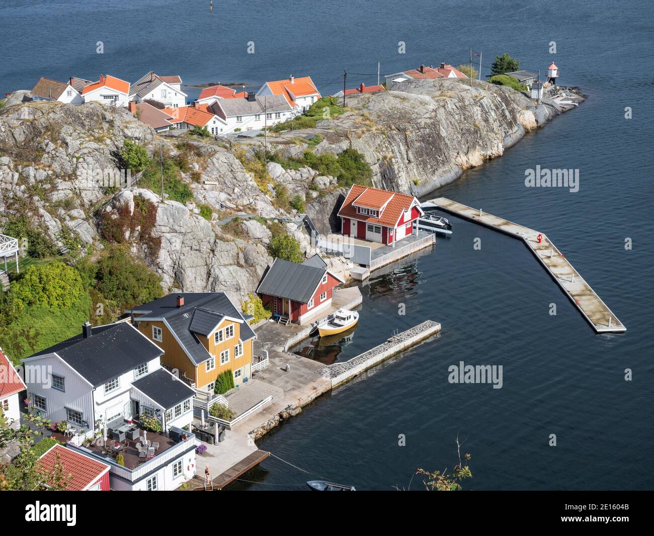 Typical white wooden houses at the waterfront, island Kragero, southern norwegian coast, Norway Stock Photo