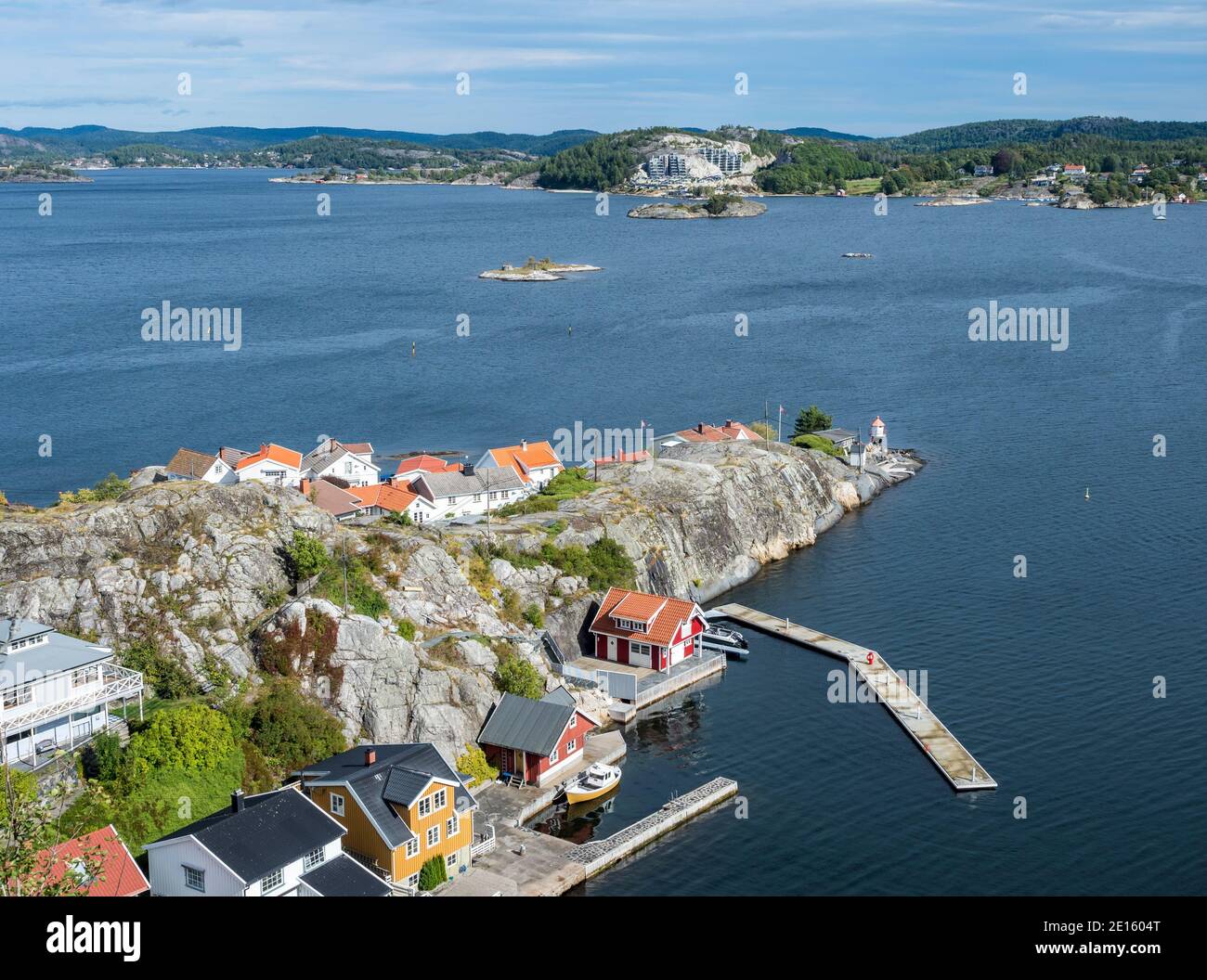 Typical white wooden houses at the waterfront, island Kragero, southern norwegian coast, Norway Stock Photo