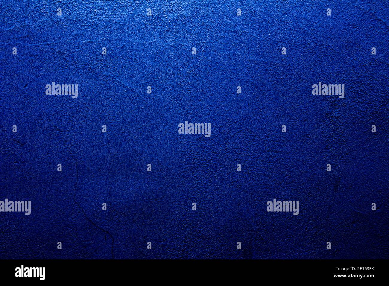 Blue colored abstract wall background with textures of different shades of blues Stock Photo