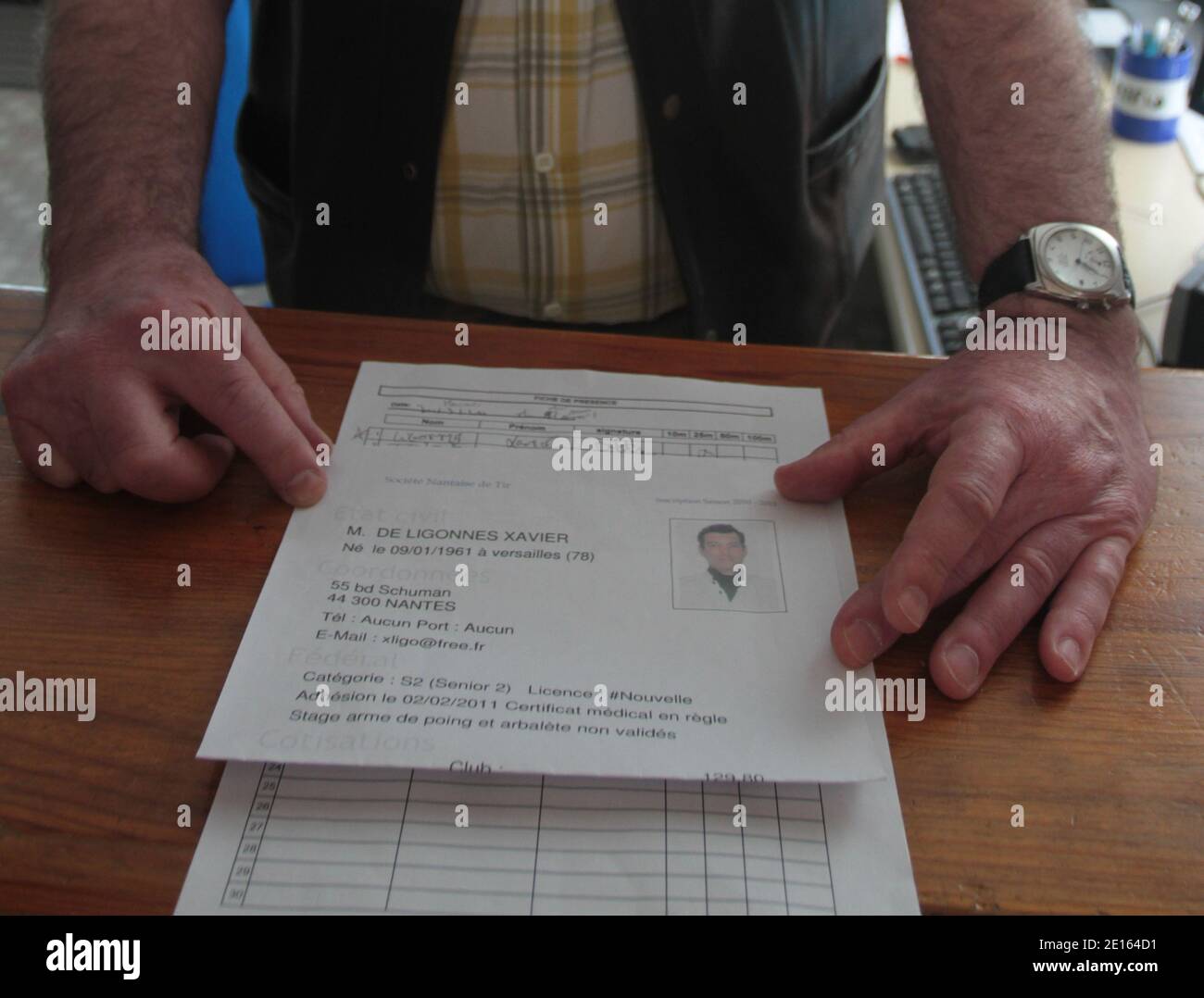 The enrolment form of Xavier Dupont de Ligonnes at the Jammonieres Rifle Club in La Chapelle-sur-Erdre, near Nantes. French authorities have issued an international search alert for murder suspect Xavier Dupont de Ligonnes amid evidence that he carefully planned the killing of his wife and four children. The 50-year-old businessman is wanted after the bodies of his wife and children aged 13 to 20 were dug up in the garden of their family home in the western city of Nantes, Brittany, on Thursday. Autopsies done on the bodies showed the victims had been 'methodically' shot with a .22 calibre fir Stock Photo