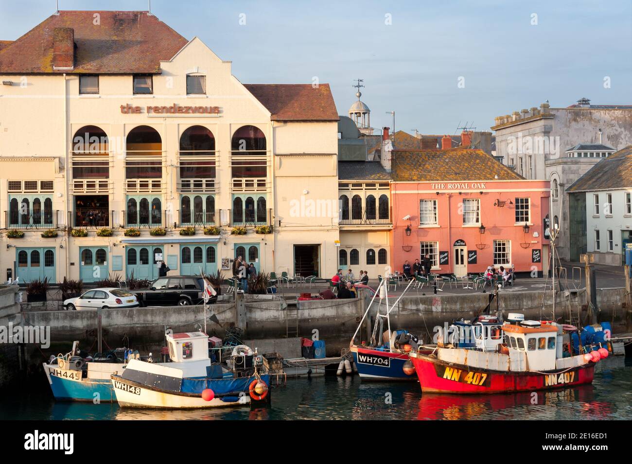 WEYMOUTH, DORSET, UK - MARCH 15, 2009:  View of the Old Harbour with the Rendezvous and Royal Oak pub in the background Stock Photo