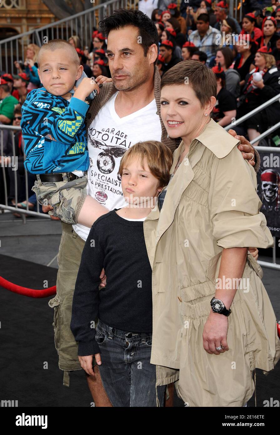 Natalie Maines and Adrian Pasdar attend the world premiere of Disney's